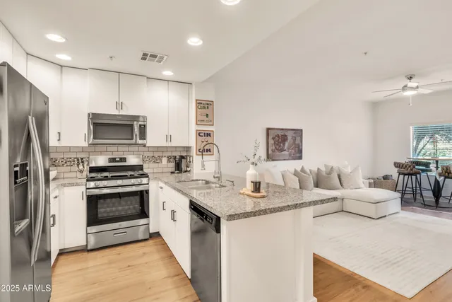 $330,000 | 5450 East Deer Valley Drive, Unit 1004, Phoenix, AZ 85054