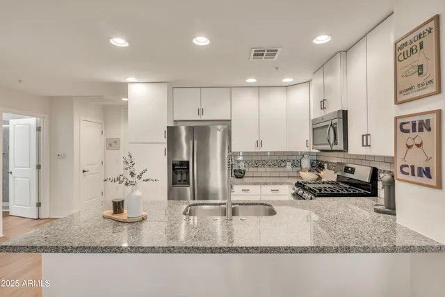 $330,000 | 5450 East Deer Valley Drive, Unit 1004, Phoenix, AZ 85054