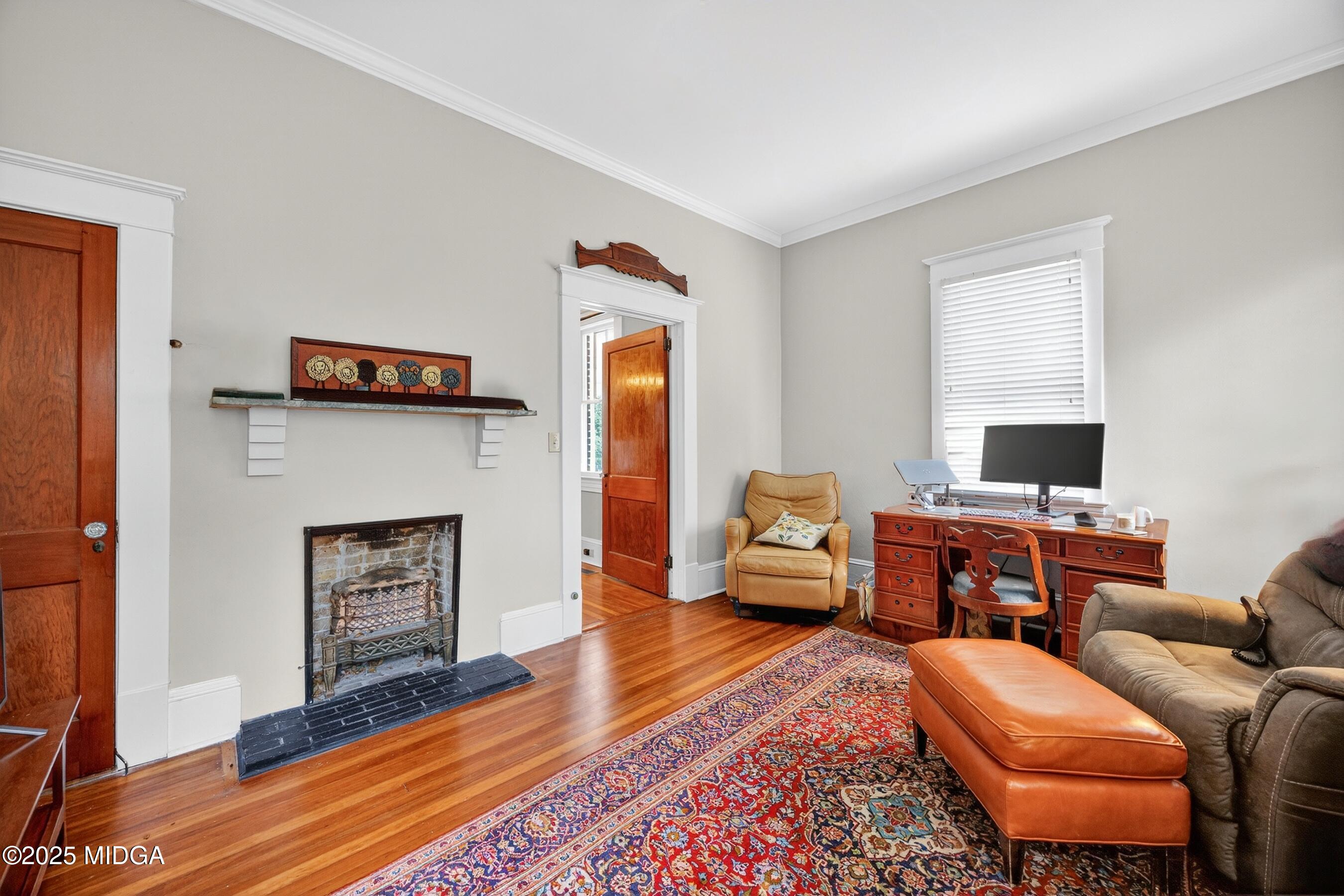 3341 Ridge Avenue Macon, GA 31204 - Photo 17 of 46 a living room with furniture and a fireplace