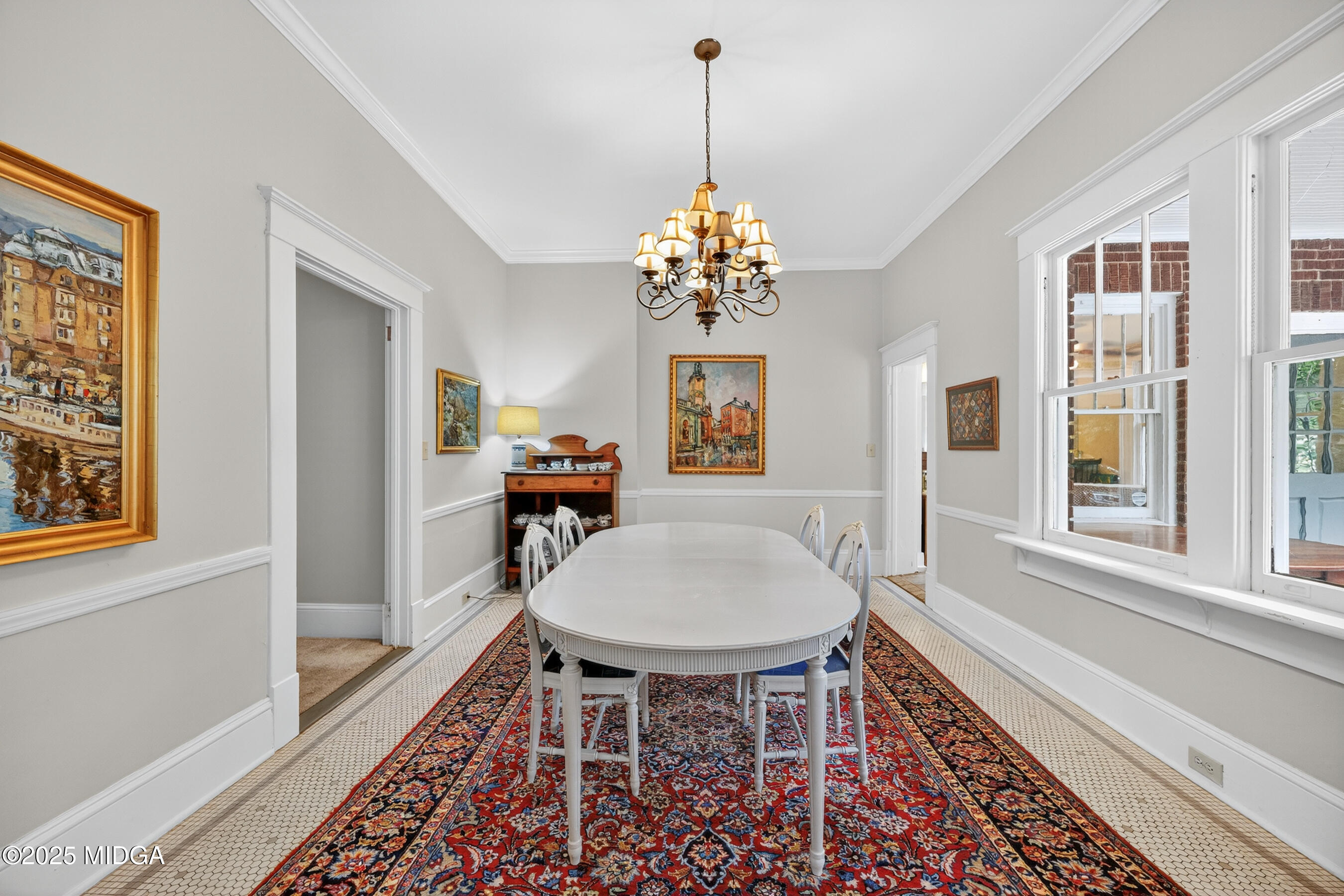 3341 Ridge Avenue Macon, GA 31204 - Photo 18 of 46 a dining room with chandelier and wooden floor