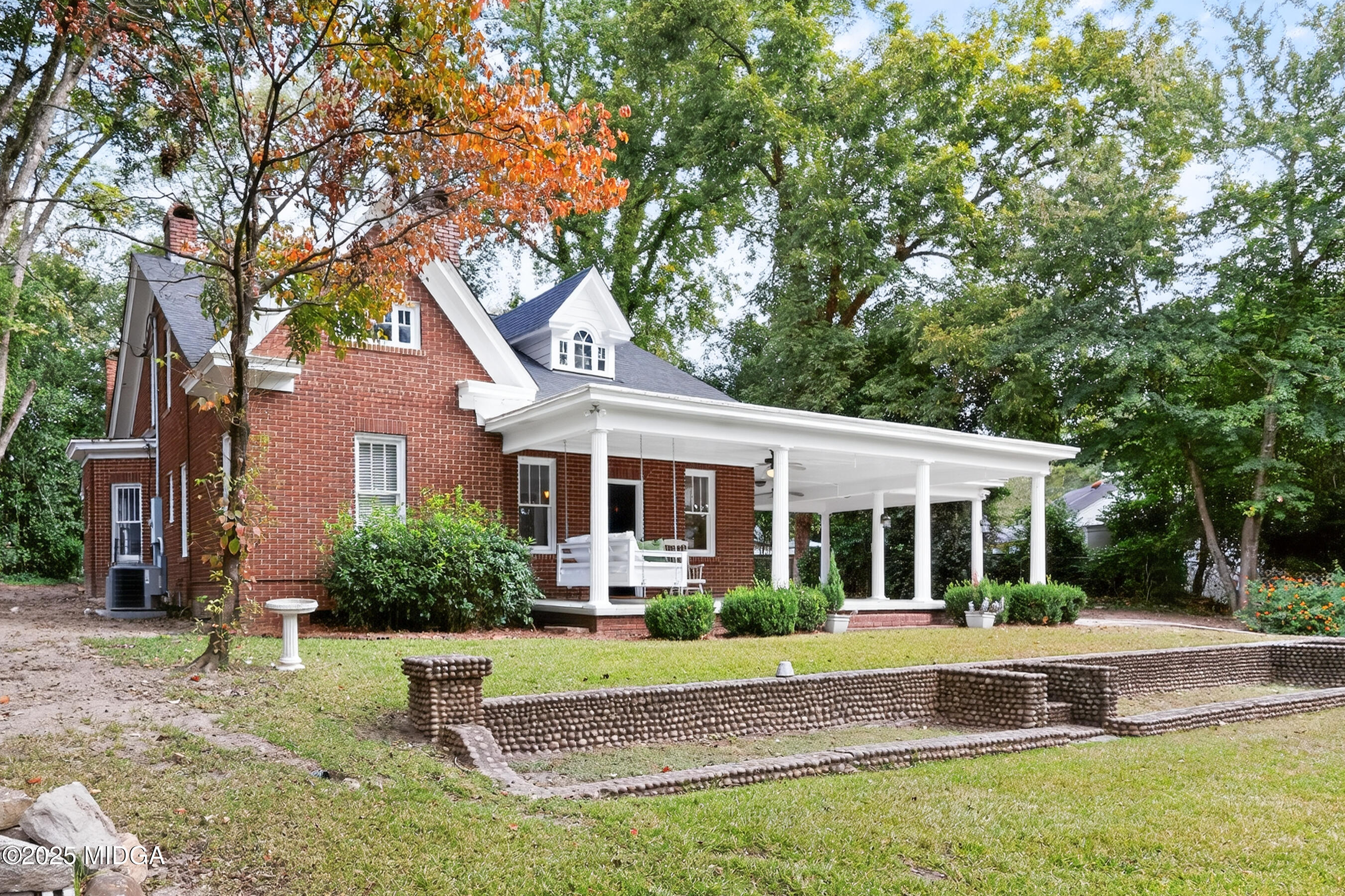 3341 Ridge Avenue Macon, GA 31204 - Photo 2 of 46 a view of house with a big yard and large tree