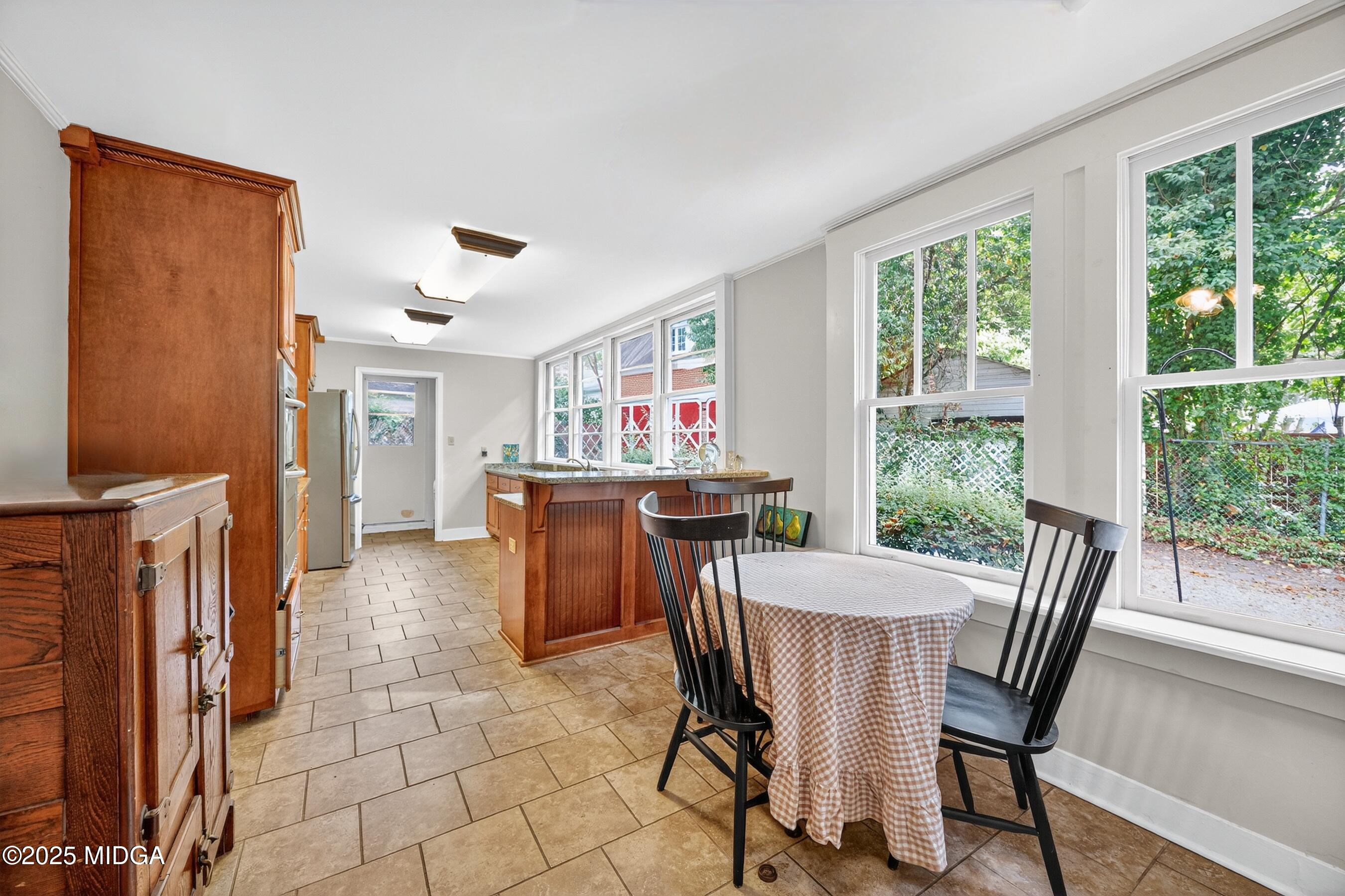 3341 Ridge Avenue Macon, GA 31204 - Photo 23 of 46 a dining room with furniture and window
