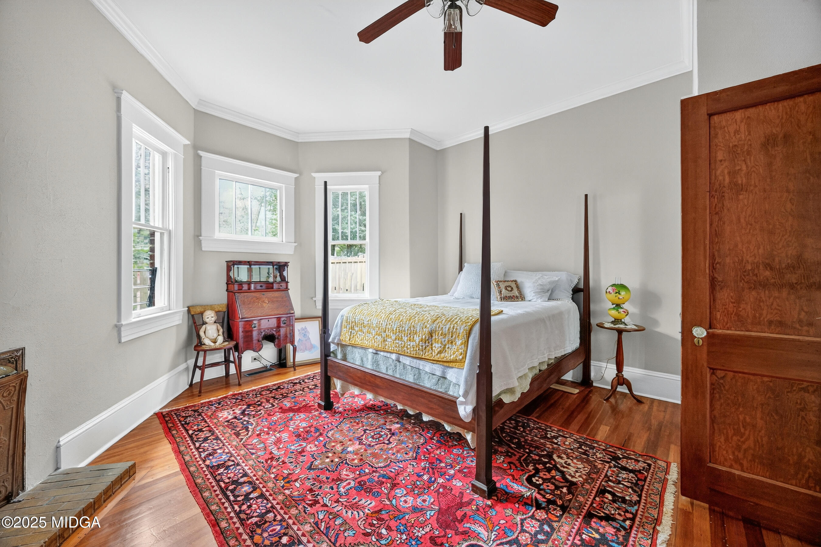 3341 Ridge Avenue Macon, GA 31204 - Photo 25 of 46 a bedroom with a bed and wooden floor