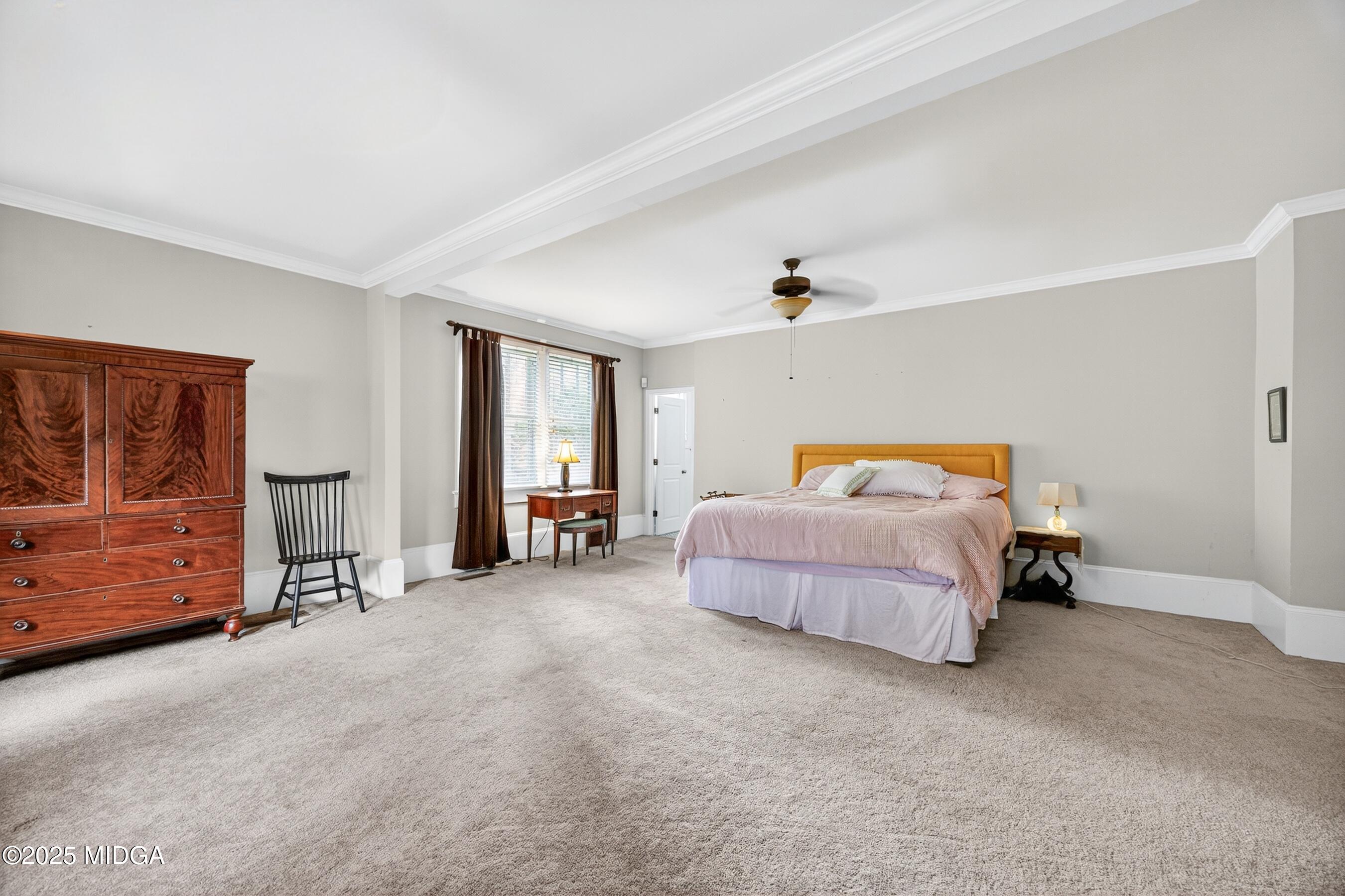 3341 Ridge Avenue Macon, GA 31204 - Photo 28 of 46 a bedroom with a bed and dresser