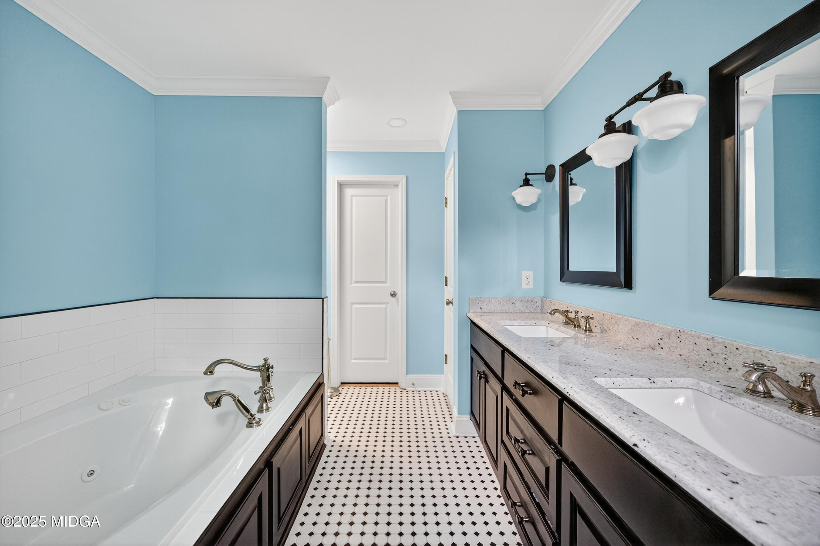 3341 Ridge Avenue Macon, GA 31204 - Photo 31 of 46 a bathroom with a granite countertop double vanity sink a mirror and a bathtub