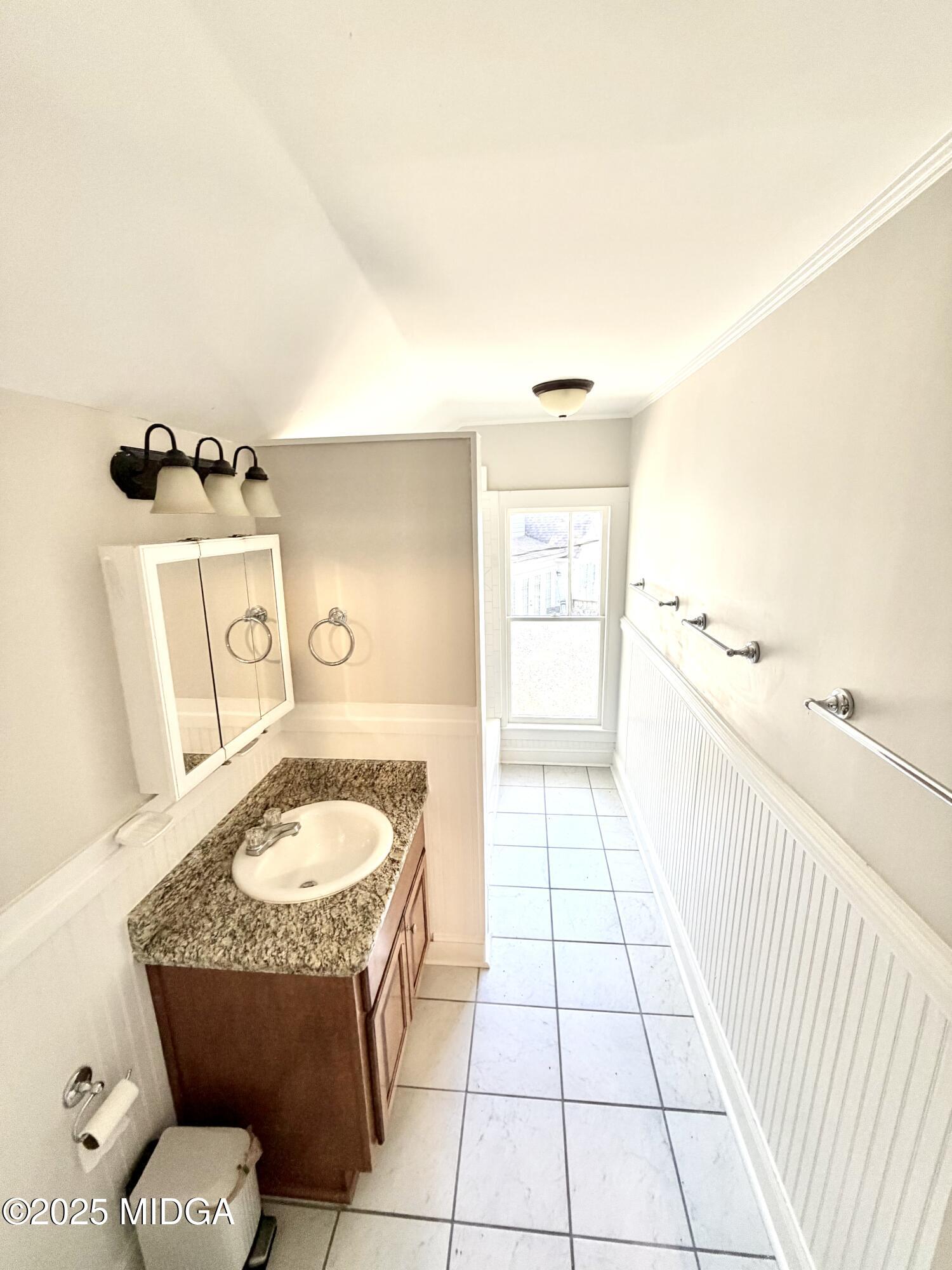 3341 Ridge Avenue Macon, GA 31204 - Photo 33 of 46 a living room with a couch and a table