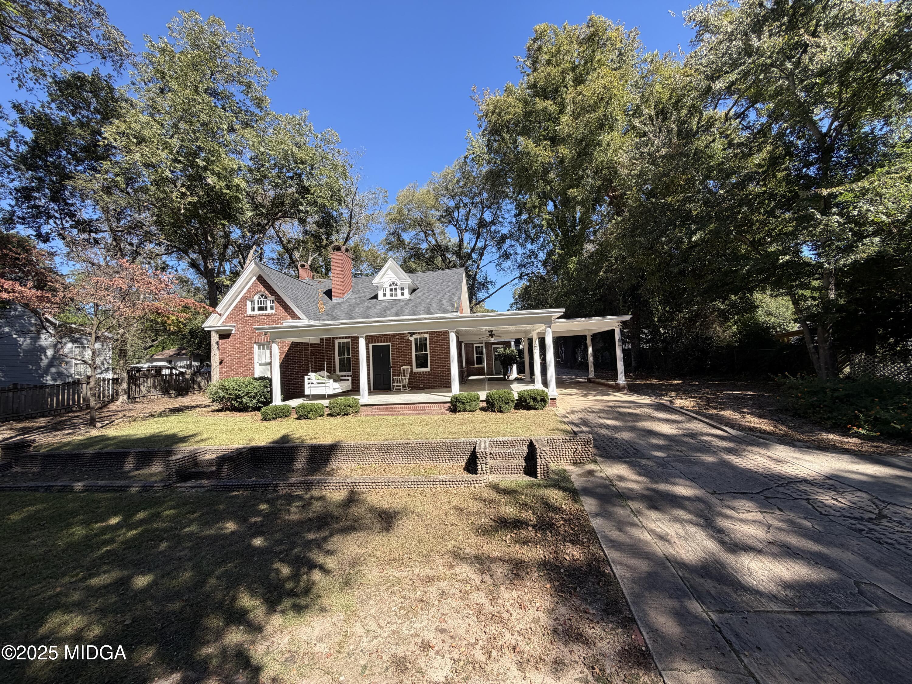 3341 Ridge Avenue Macon, GA 31204 - Photo 42 of 46 a front view of a house with a yard