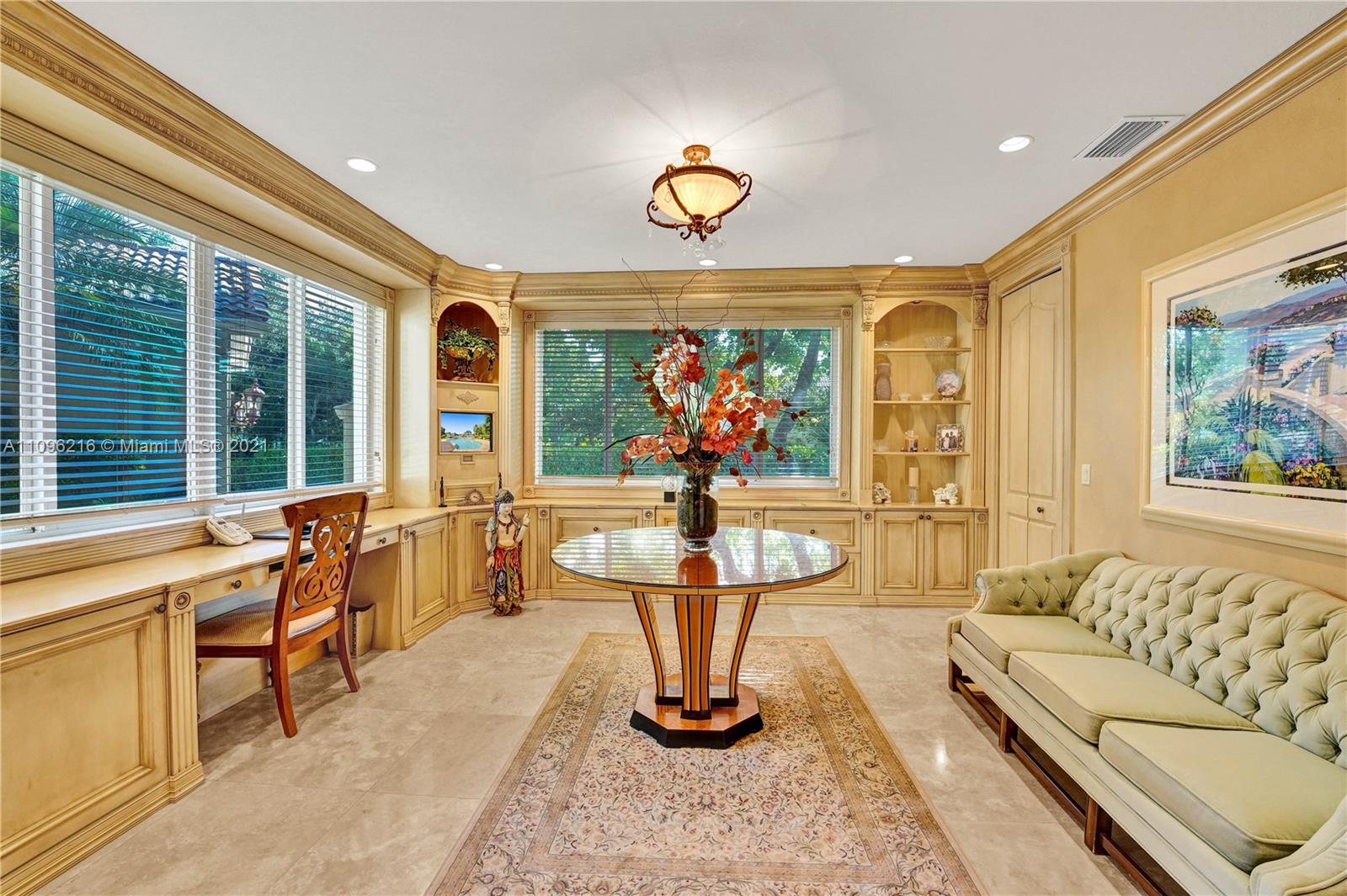 2755 Paddock Road Weston, FL 33331 - Photo 26 of 51 a living room with furniture a window and a chandelier