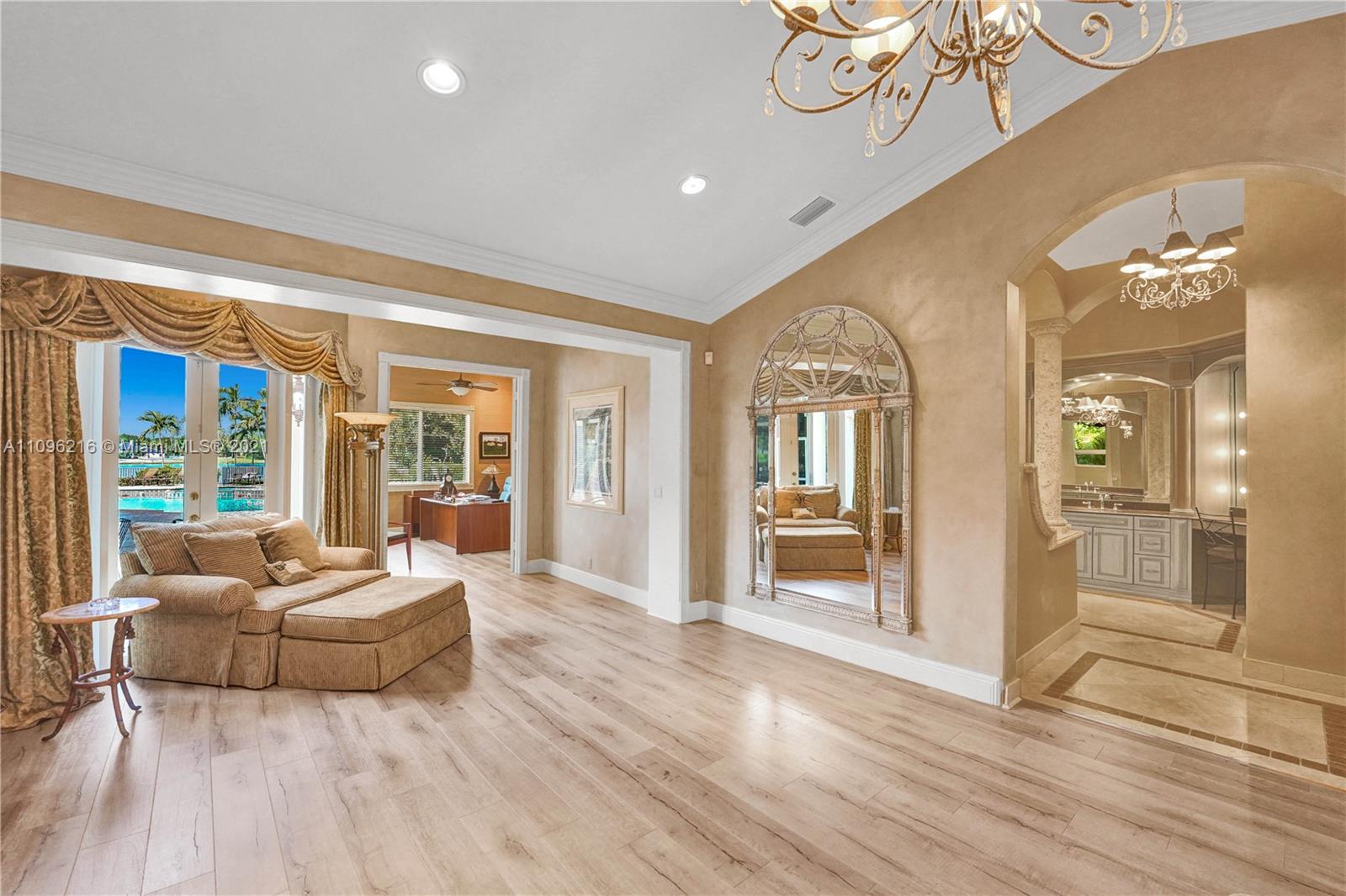 2755 Paddock Road Weston, FL 33331 - Photo 10 of 51 a living room with furniture and a large window