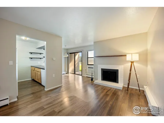 a view of a livingroom with wooden floor