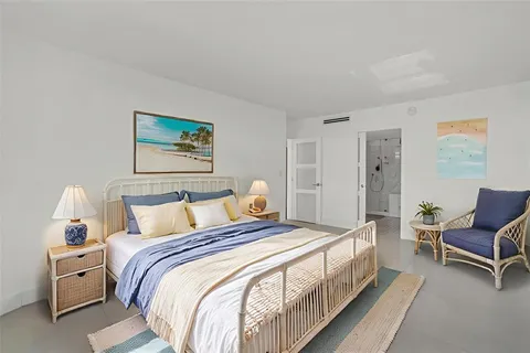 a view of a hallway with wooden shelves