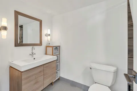 a view of a patio with furniture