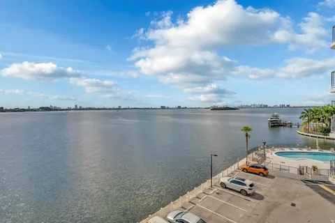 a view of a lake with a big yard