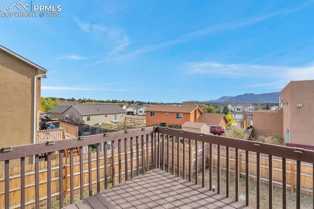 a view of a balcony with an outdoor space