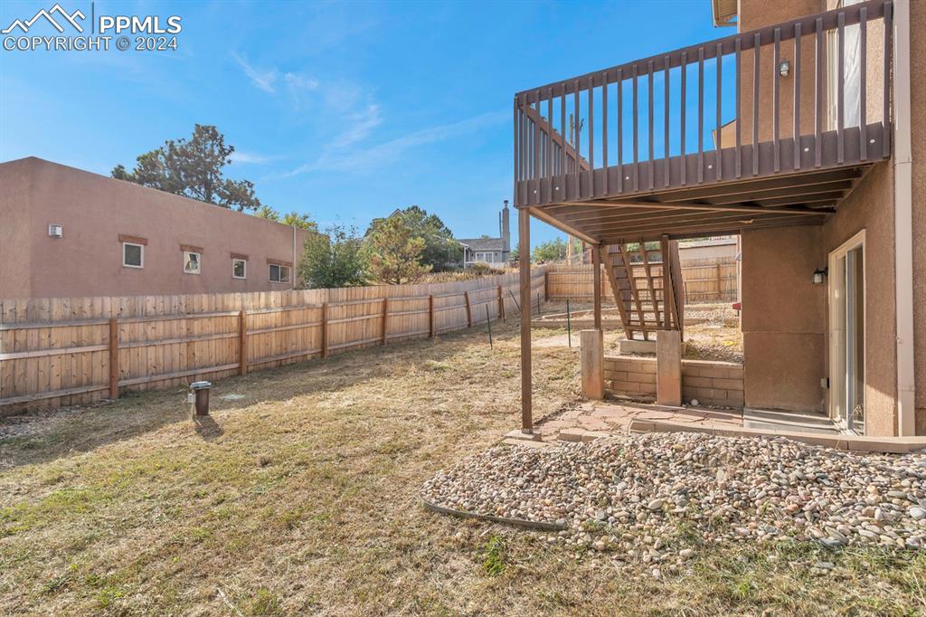 861 Circle Road Palmer Lake, CO 80133 - Photo 36 of 41 a view of a backyard