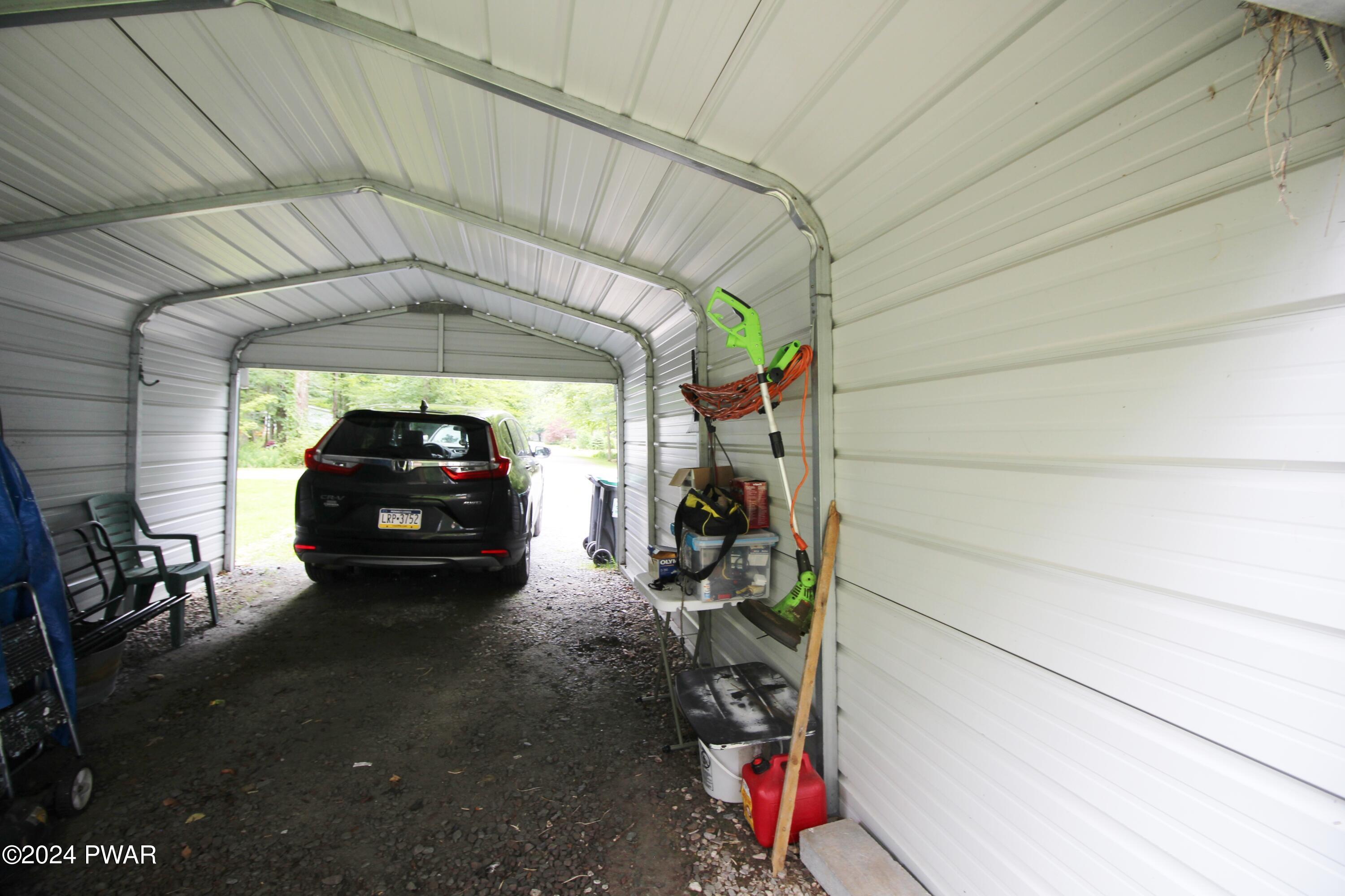 10 Madison Estate Moscow, PA 18444 - Photo 42 of 45 a view of car parked in garage