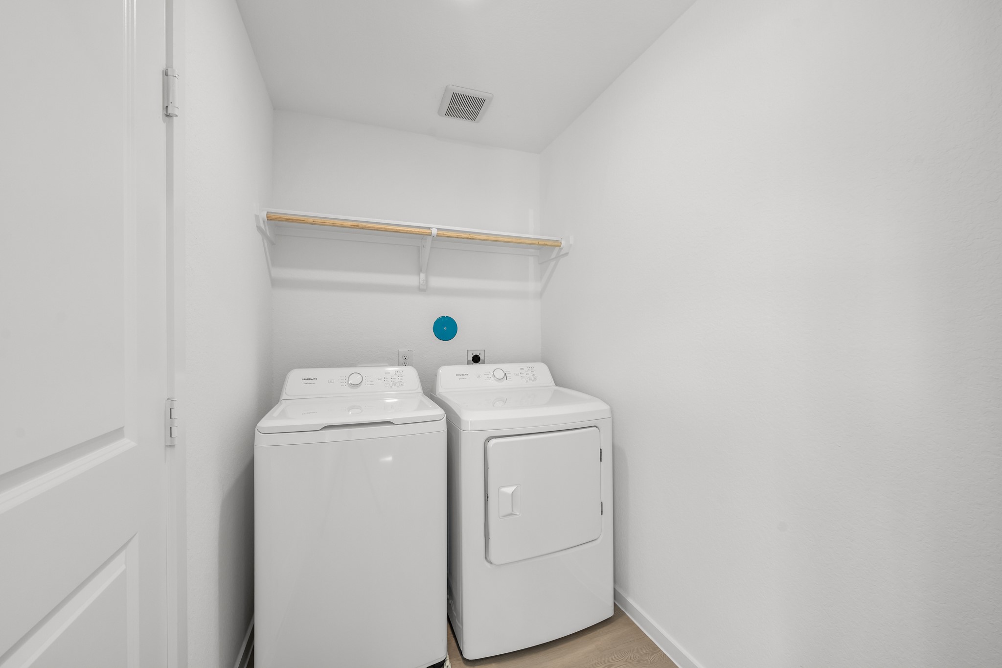 10583 Altitude Way Conroe, TX 77303 - Photo 12 of 33 a utility room with dryer and washer