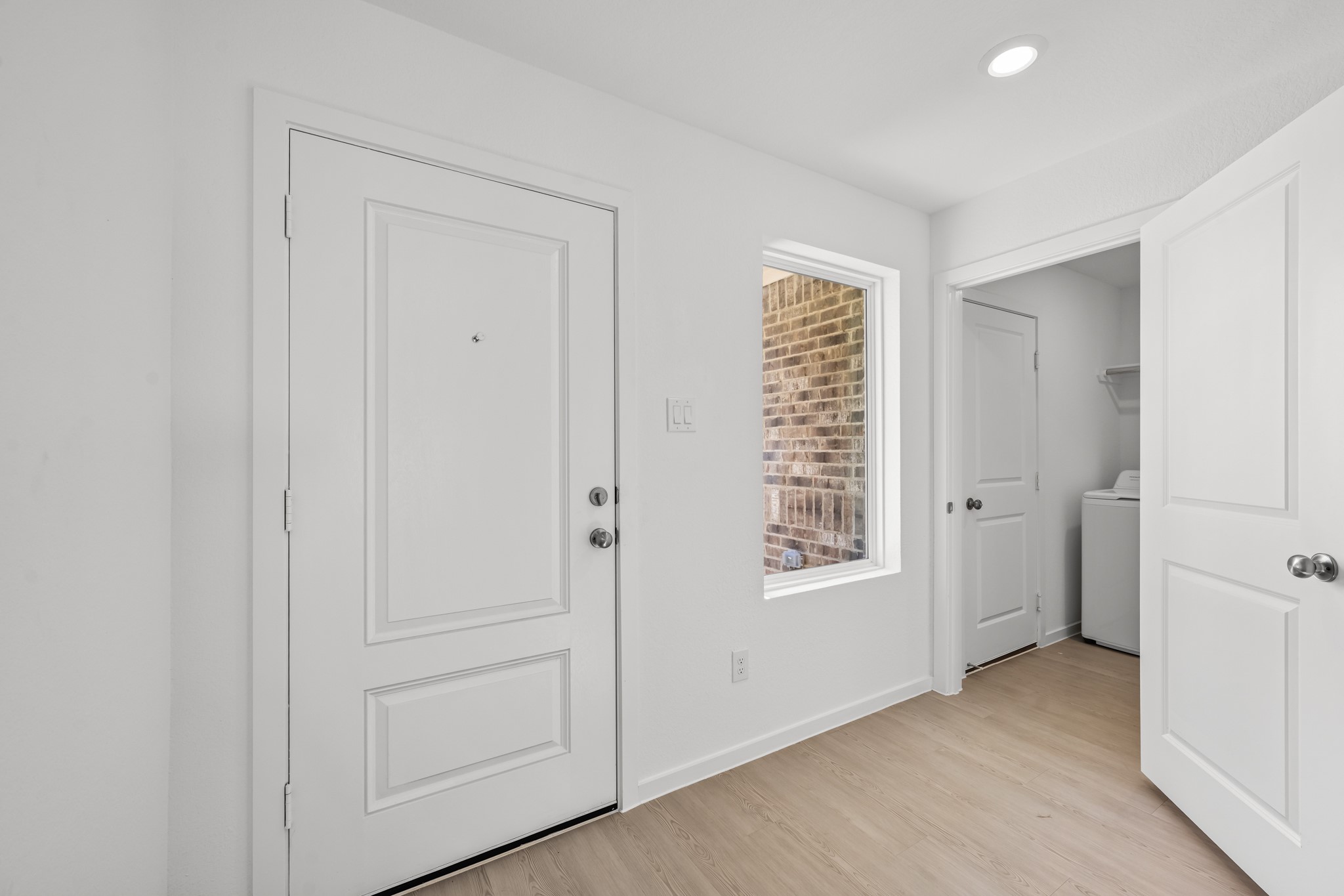 10583 Altitude Way Conroe, TX 77303 - Photo 13 of 33 a view of an empty room with closet and a window