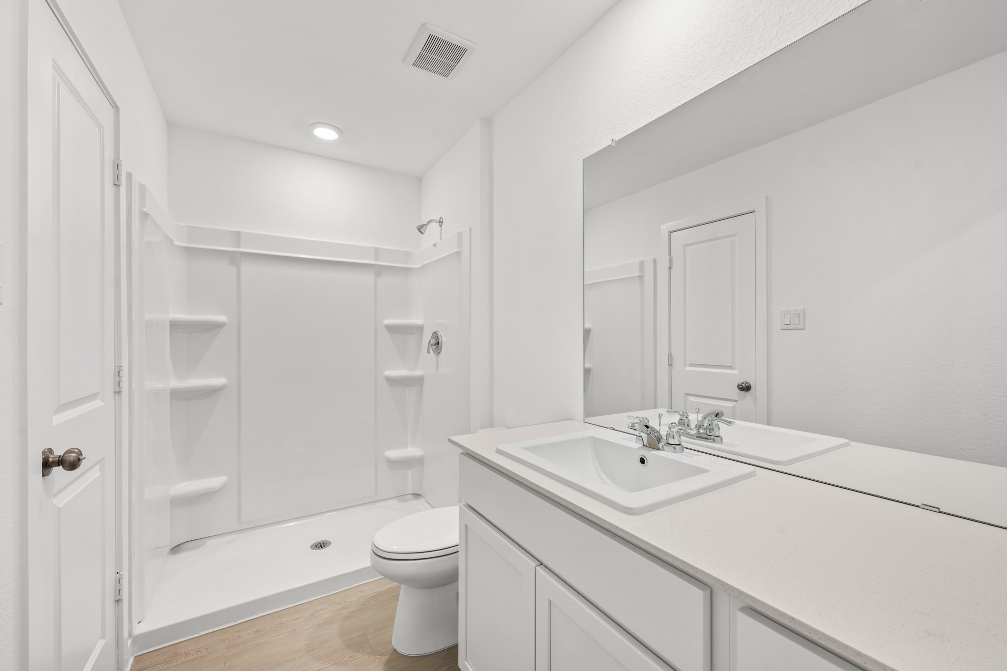 10583 Altitude Way Conroe, TX 77303 - Photo 28 of 33 a bathroom with a sink a toilet and shower