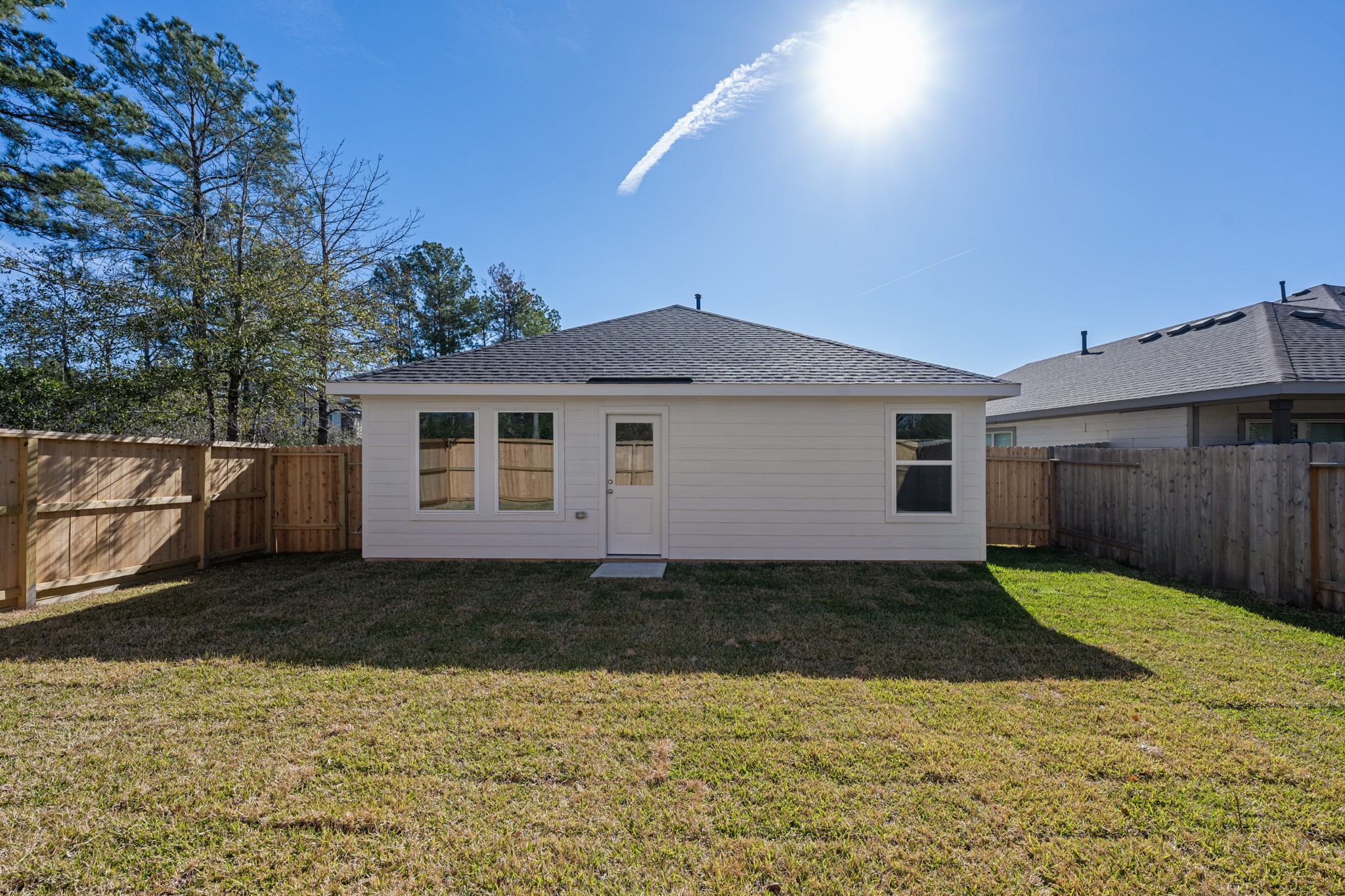 10583 Altitude Way Conroe, TX 77303 - Photo 31 of 33 a backyard of a house