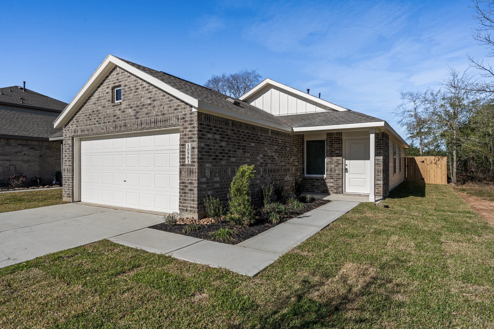 10583 Altitude Way Conroe, TX 77303 - Photo 5 of 33 a view of a house with a yard
