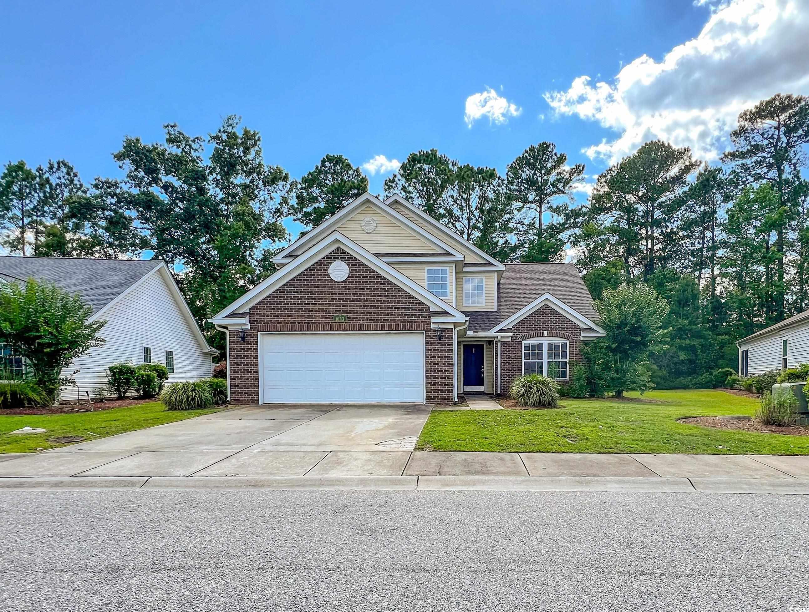 1033 Mccall Loop Conway, SC 29526 - Photo 1 of 40 Traditional-style home with brick siding, an attac