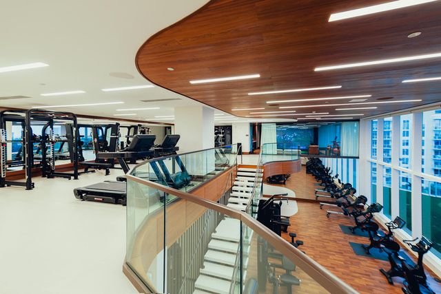 a living room with pool table and a flat screen tv