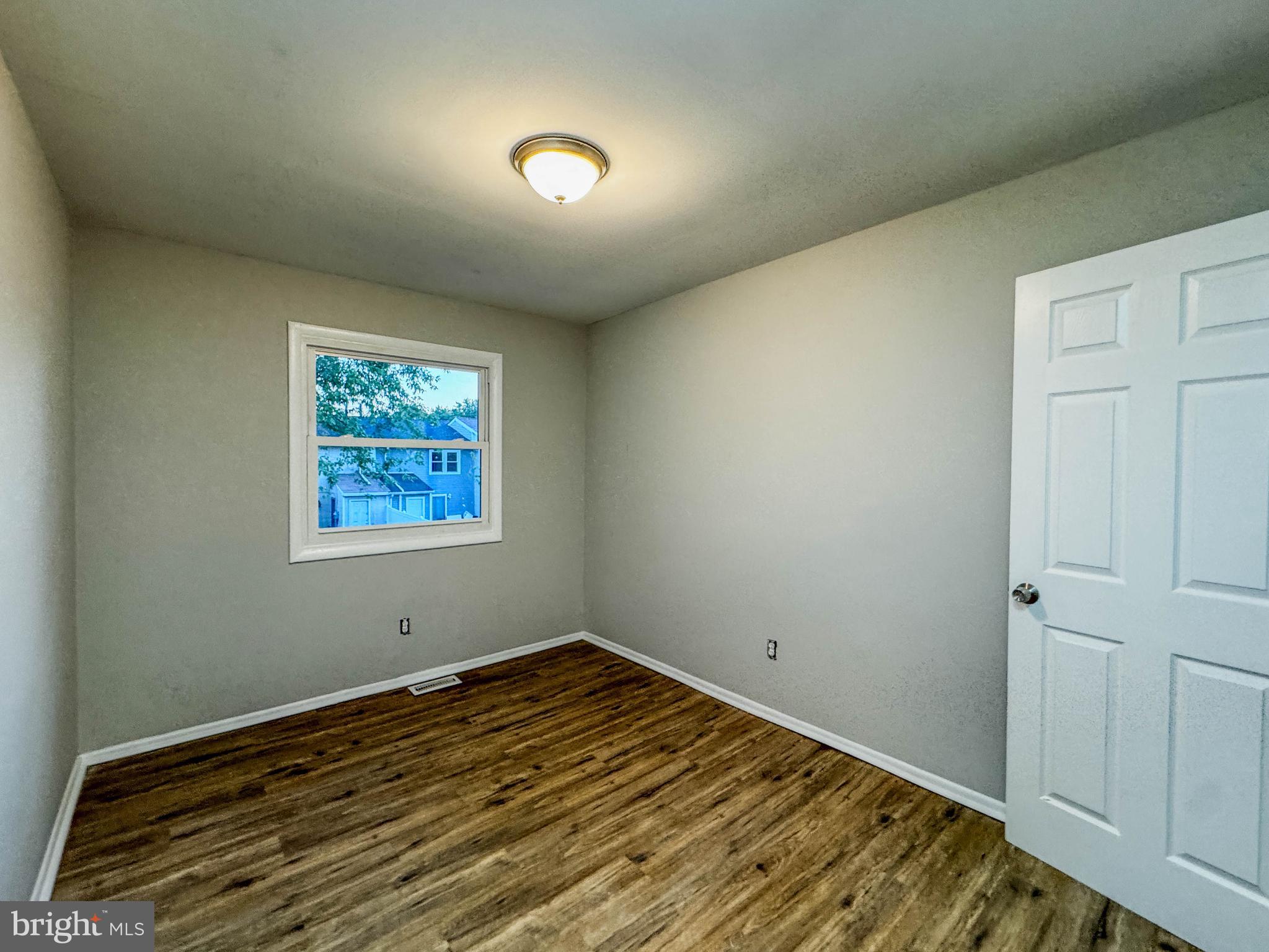 4 Milstone Court Sicklerville, NJ 08081 - Photo 13 of 23 an empty room with wooden floor and closet
