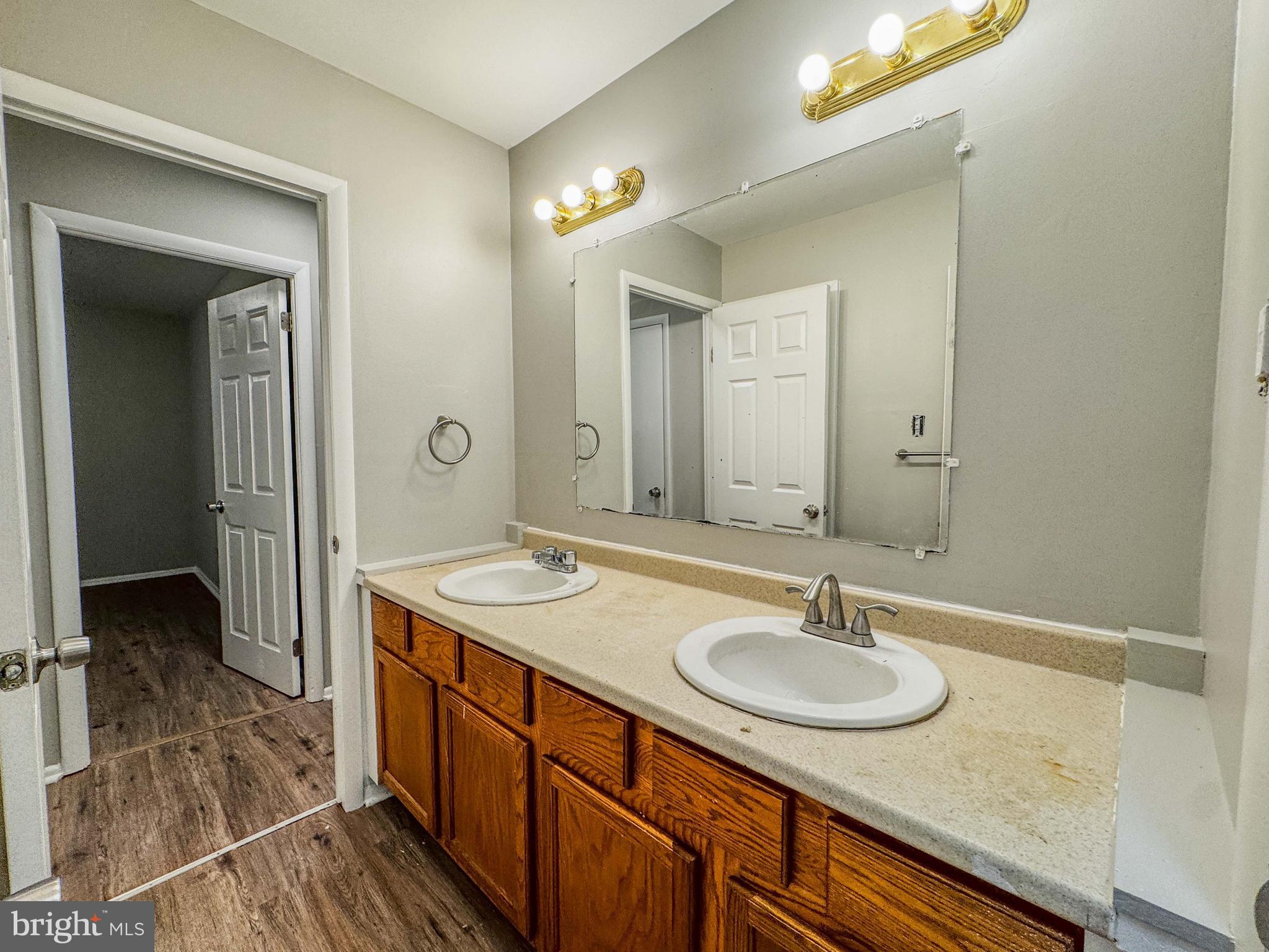 4 Milstone Court Sicklerville, NJ 08081 - Photo 19 of 23 a bathroom with a sink and a mirror