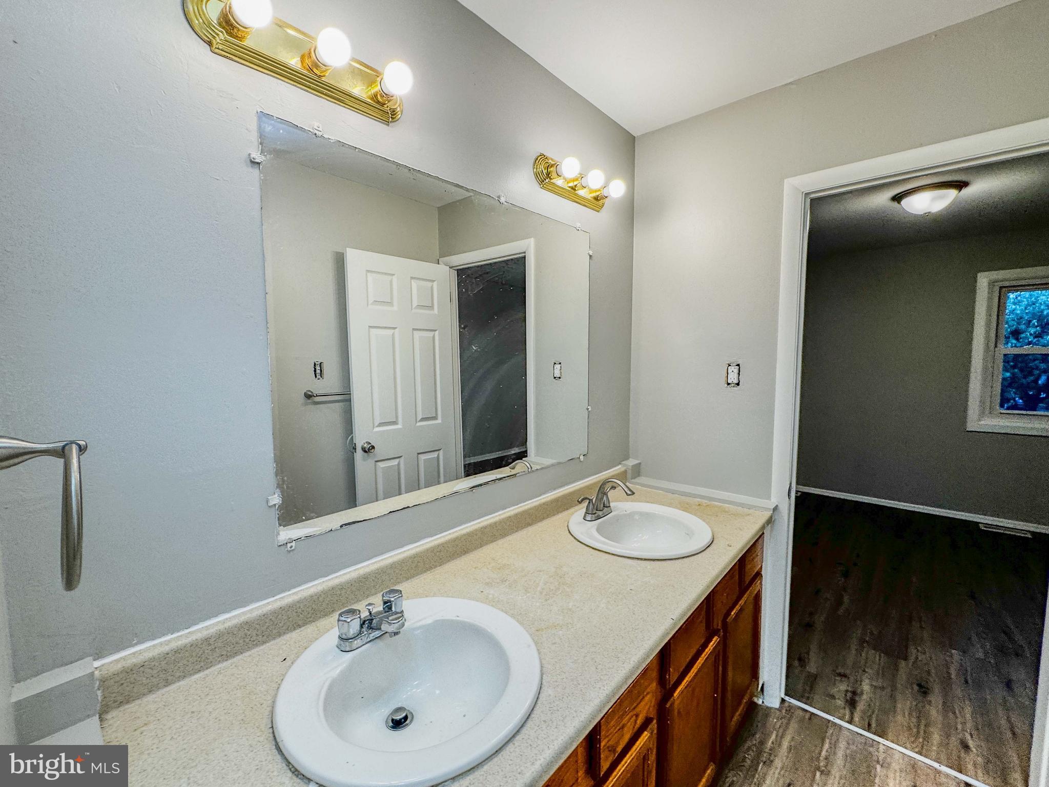 4 Milstone Court Sicklerville, NJ 08081 - Photo 20 of 23 a bathroom with a sink double vanity and a mirror