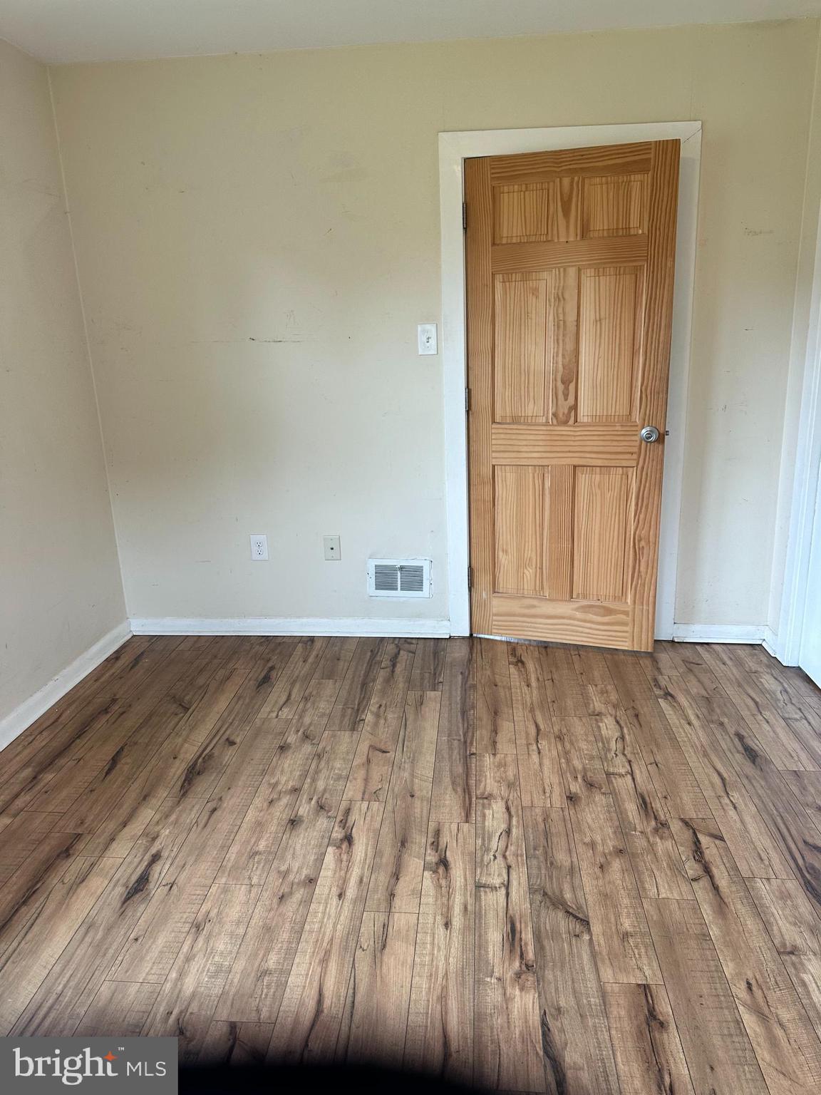 102 Myrtle Avenue Reading, PA 19606 - Photo 8 of 11 an empty room with wooden floor and closet