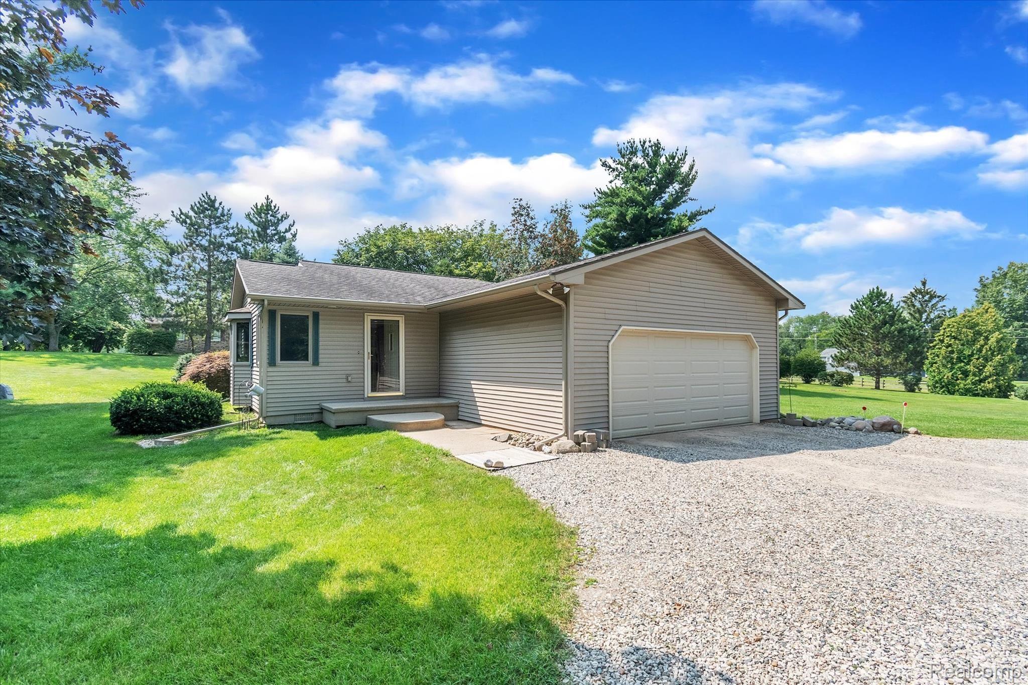 6451 Bullard Road Fenton, MI 48430 - Photo 28 of 29 View of attached two car garage