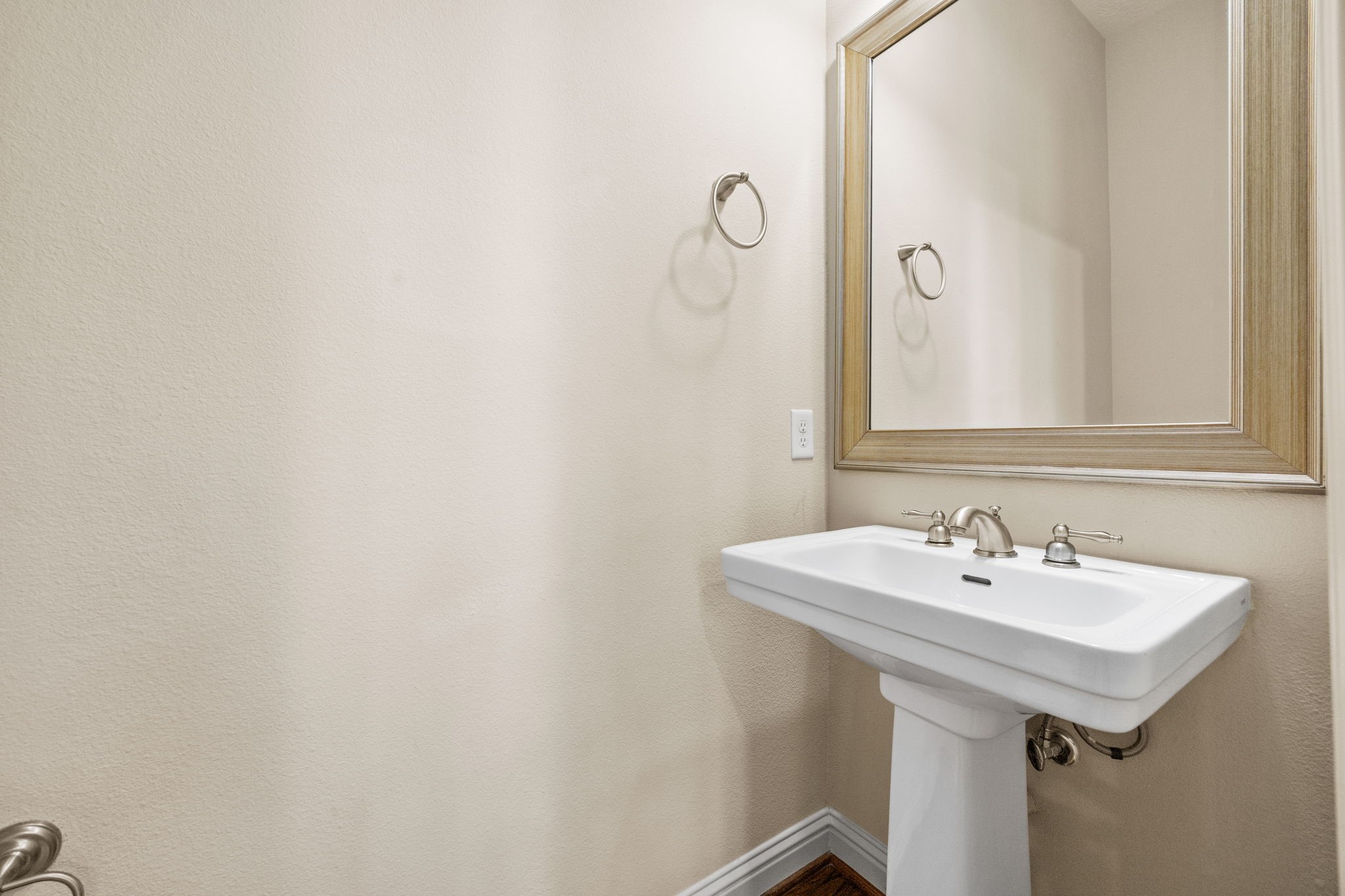5213 Eigel Street, Unit A Houston, TX 77007 - Photo 19 of 30 a bathroom with a sink and a mirror