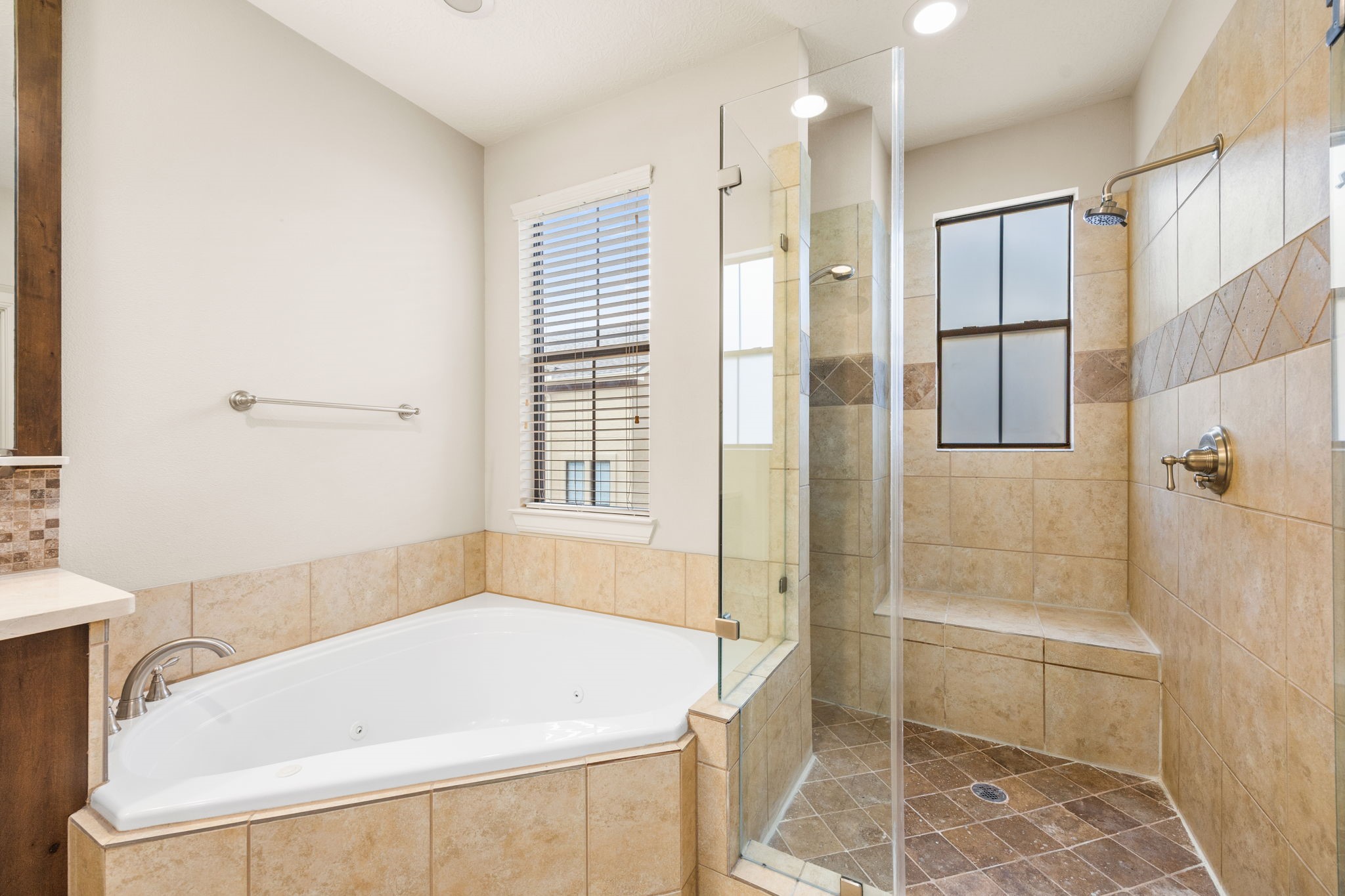 5213 Eigel Street, Unit A Houston, TX 77007 - Photo 23 of 30 a bathroom with a bathtub and a shower