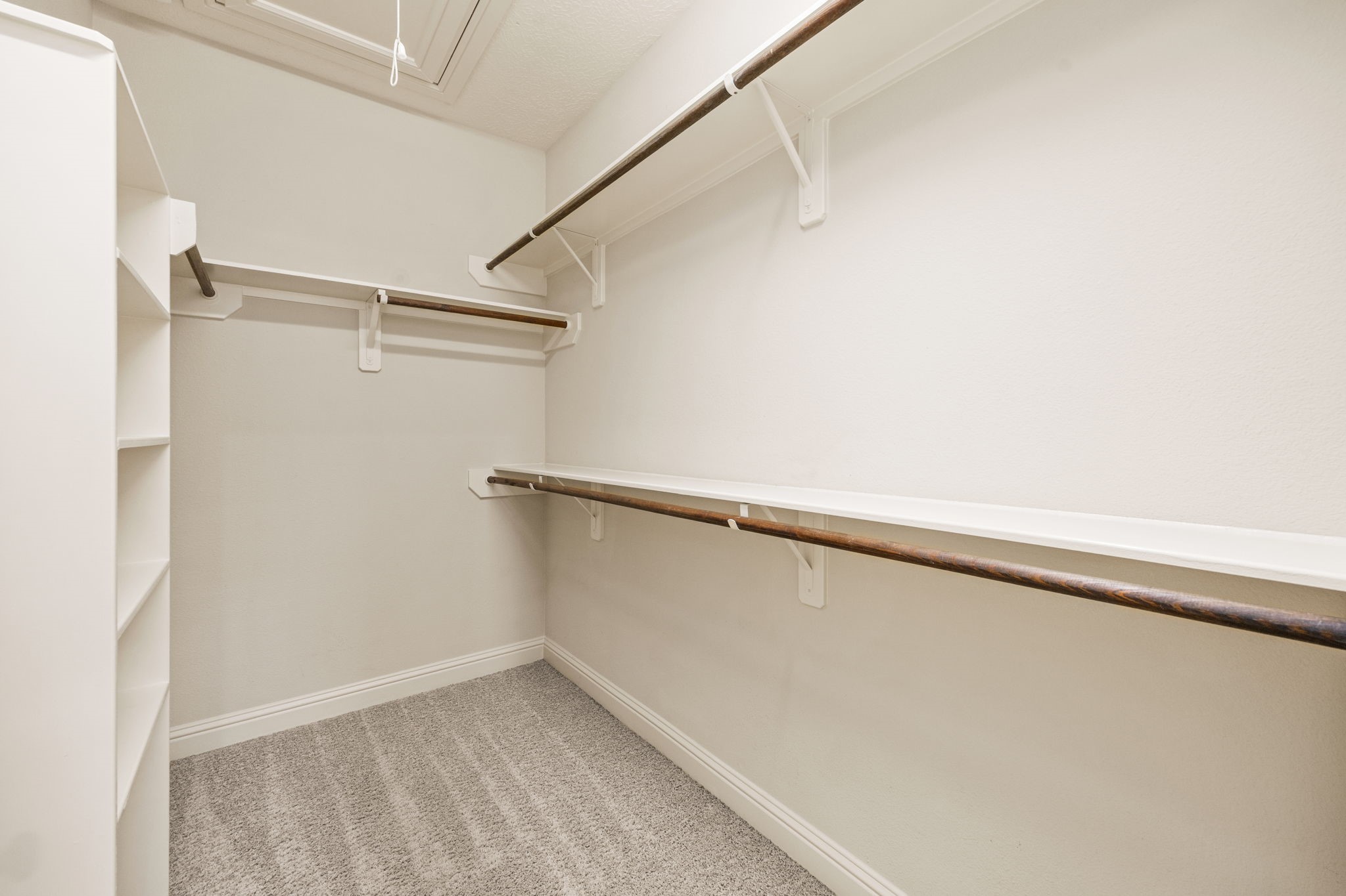 5213 Eigel Street, Unit A Houston, TX 77007 - Photo 24 of 30 a view of an empty walk in closet