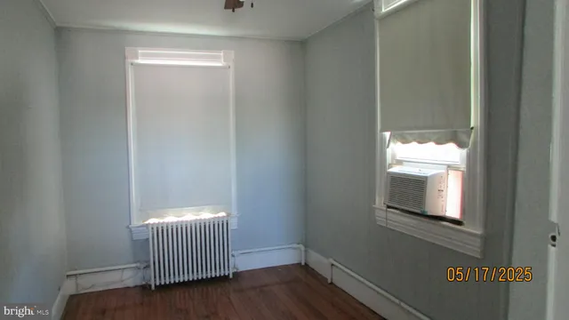 a view of a room that has a window in it