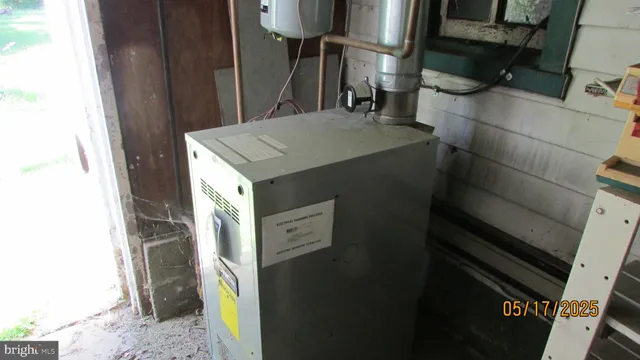 a bathroom with a shower and a mirror