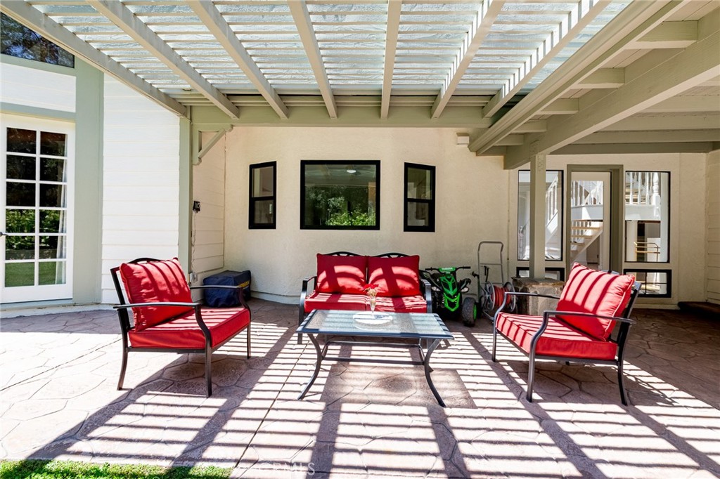 15601 Saddleback Road Canyon Country, CA 91387 - Photo 39 of 55 a outdoor space with lots of chairs and a table
