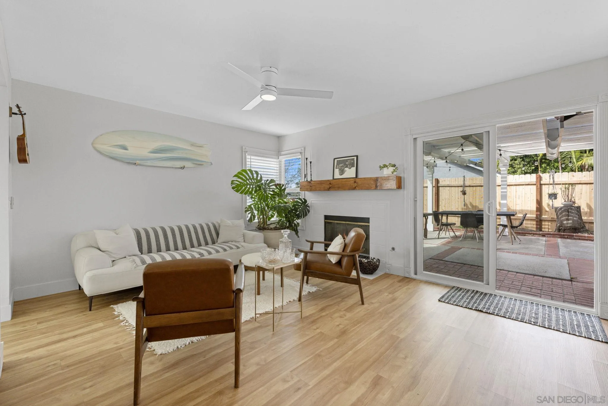 5392 Blackberry Way Oceanside, CA 92057 - Photo 11 of 37 a living room with furniture and a fireplace