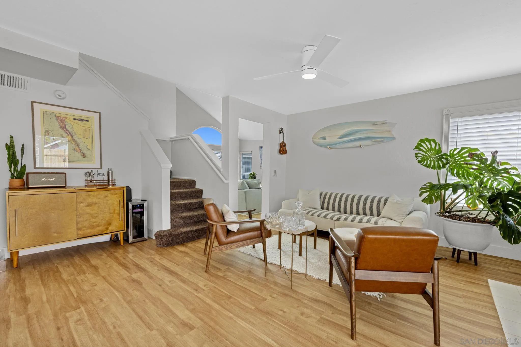 5392 Blackberry Way Oceanside, CA 92057 - Photo 12 of 37 a living room with furniture and a wooden floor
