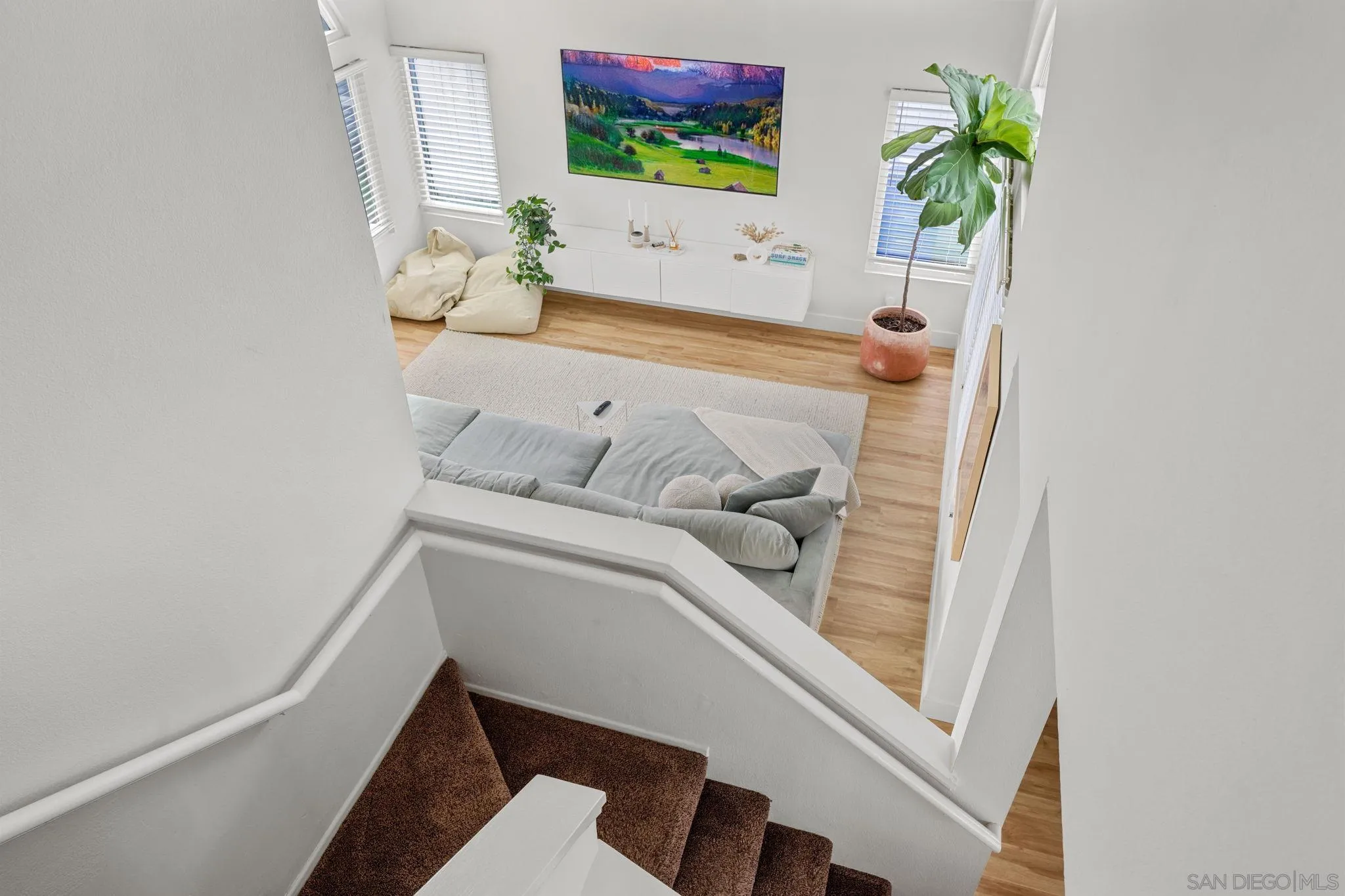 5392 Blackberry Way Oceanside, CA 92057 - Photo 21 of 37 a room with a bed and a flat screen tv