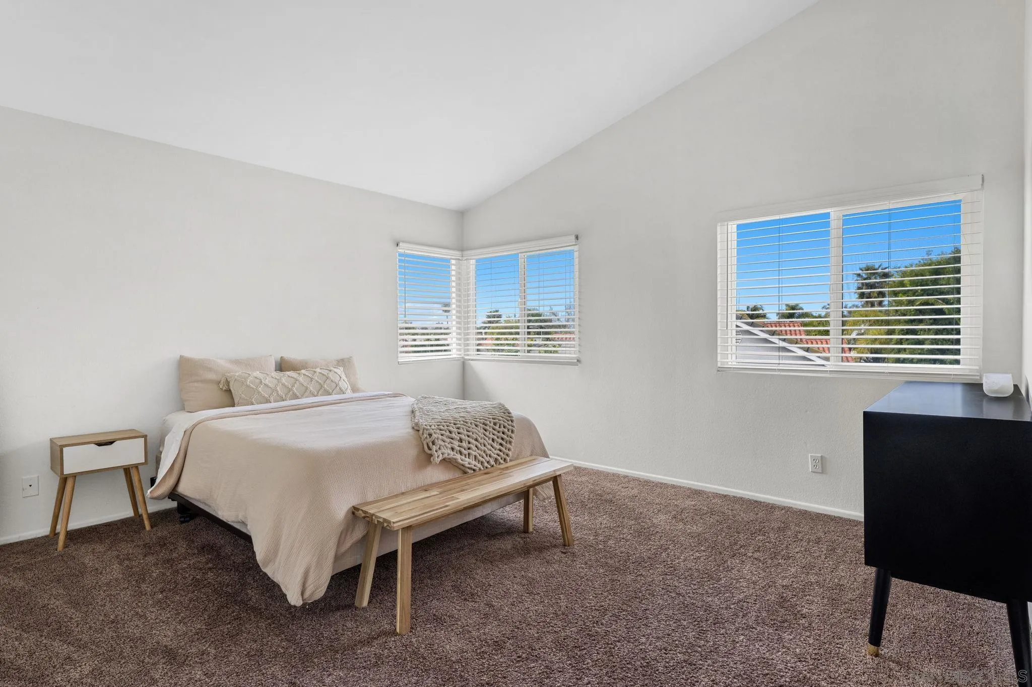 5392 Blackberry Way Oceanside, CA 92057 - Photo 25 of 37 a spacious bedroom with a bed and a window