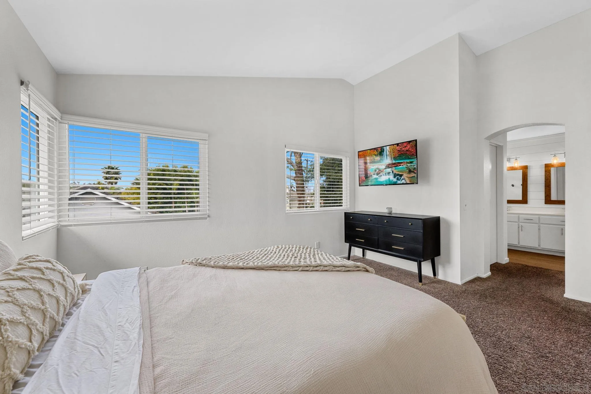 5392 Blackberry Way Oceanside, CA 92057 - Photo 26 of 37 a bedroom with a bed and a window