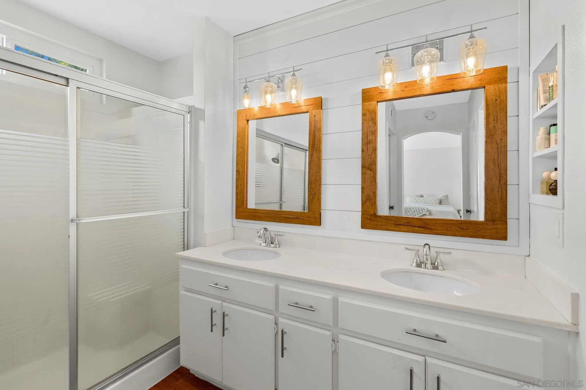 5392 Blackberry Way Oceanside, CA 92057 - Photo 28 of 37 a bathroom with a sink and a mirror