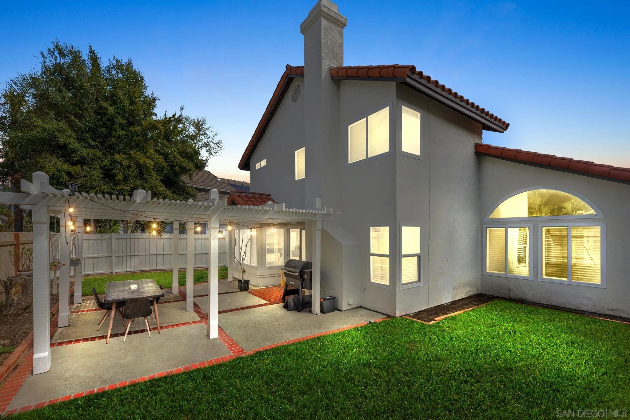 5392 Blackberry Way Oceanside, CA 92057 - Photo 37 of 37 a front view of a house with a yard