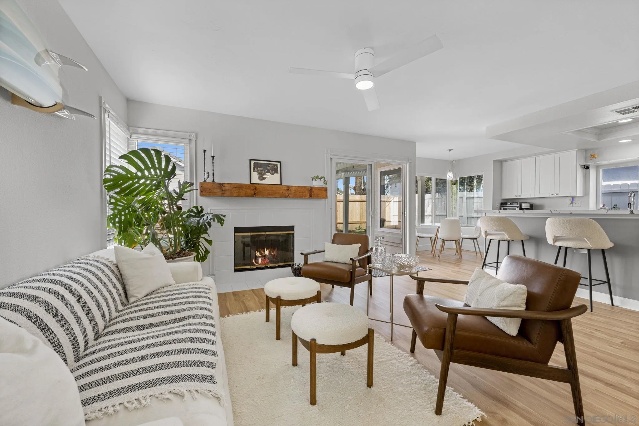 5392 Blackberry Way Oceanside, CA 92057 - Photo 10 of 37 a living room with furniture and a fireplace