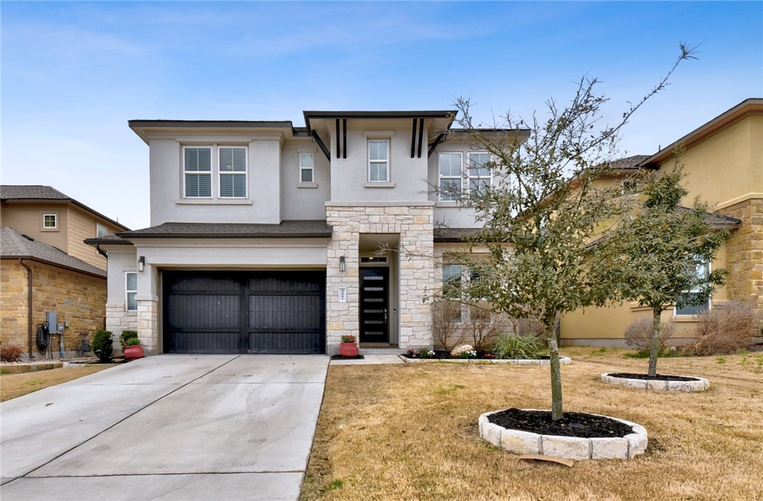 a front view of a house with entertaining space