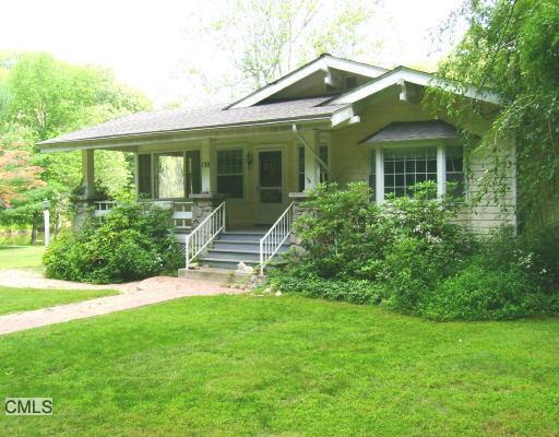158 Florida Hill Road Ridgefield, CT 06877 - Photo 1 of 1 a front view of a house with a yard and porch