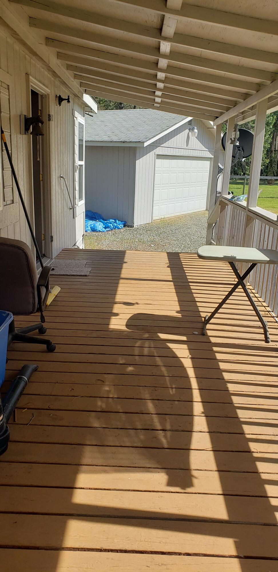 7055 Takilma Road Cave Junction, OR 97523 - Photo 5 of 27 covered front deck on home