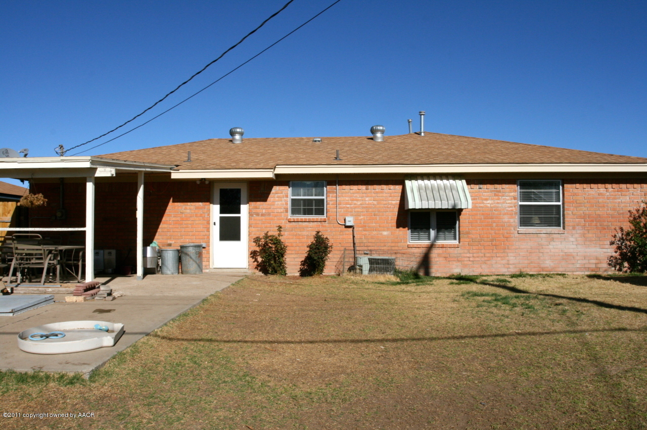 5332 Capulin Lane Amarillo, TX 79110 - Photo 10 of 10 a front view of a house with a big yard